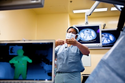 Dr. Calvin Law of Sunnybrook Health Sciences Centre demonstrates how surgeons can use Kinect to manipulate patient images. Image courtesy of Doug Nicholson/MediaSource.