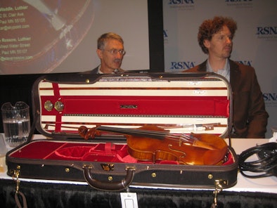 John Waddle, Left, And Steve Rossow, Sit Behind Their Copy Of The Betts Stradivarius