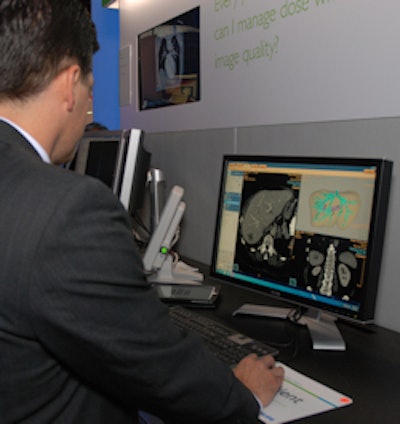 Lou Bonincontri from Philips demonstrates the intelliSpace Portal workstation.