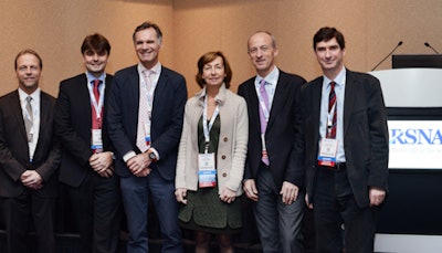 A hefty dose of Gallic charm enveloped McCormick Place on Monday, when four experts from France spoke at a special session about cancer imaging. Shown here are the two moderators, Dr. Jean-Pierre Pruvo (far right) and Dr. Nicolas Grenier (far left), and speakers Dr. Alain Luciani (second from left), Dr. Eric de Kerviler (third from left), Dr. Thierry de Baere (second from right), and Dr. Valerie Vilgrain.