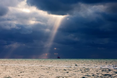 The ultrasound schooner passing glories into a storm. Image courtesy of Visual Jason Imagery.