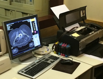 Radiologists print images on paper due to lack of resources. Image courtesy of Dr. Mansoor Fatehi.