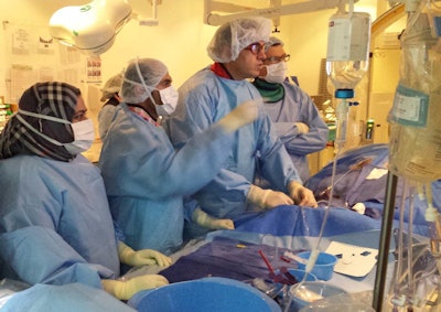 Team led by Dr. Jamal Alkoteesh at Al Ain Hospital during an embolization procedure.