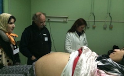 A pregnant woman receives a prenatal ultrasound exam as part of the Mobile Ultrasound Patrol initiative. Image courtesy of Trice Imaging.
