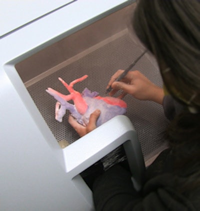 A printed 3D heart is marked to show anatomy. All images courtesy of Dr. Matthew Bramlet.