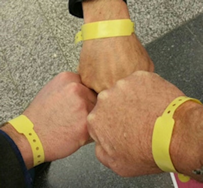 The compulsory yellow wristbands for ECR 2015 delegates.