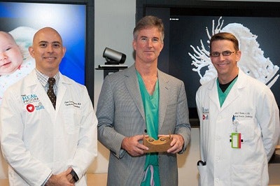 From left to right: Dr. Juan Carlos Muniz, Dr. Redmond Burke, and Dr. John Rhodes. Image courtesy of Nicklaus Children's Hospital.