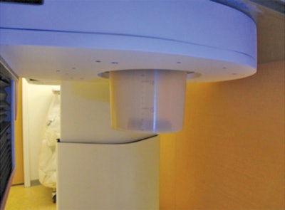 With Mammi-PET, the patient hangs her breast through an opening in the exam table and into a sleeve to measure the length of the breast. All images courtesy of AJR.