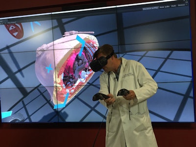 Exploring anatomy with the HTC Vive simulator at Jump. Image courtesy of Dr. Matthew Bramlet.