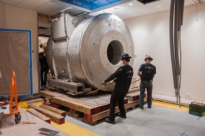 Flooring was constructed to accommodate the installation of the new device and removal of old equipment.