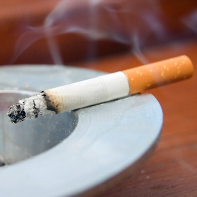 Cigarette in ashtray