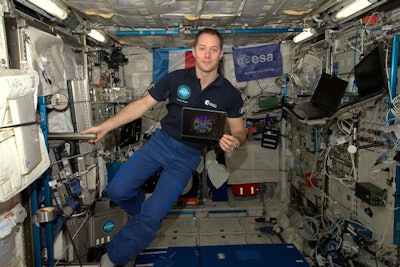 French astronaut Thomas Pasquet shows an MR image of his brain taken before he boarded the International Space Station. He returned to Earth in June 2017 after spending 196 days in orbit. Image courtesy of the European Space Agency and NASA.