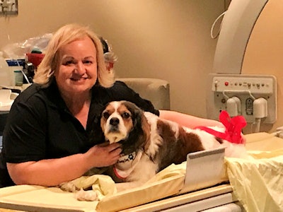Christine Paradis, from the St. John Ambulance Therapy Dog Program, is the handler for Dexter, the hospital's second canine companion.