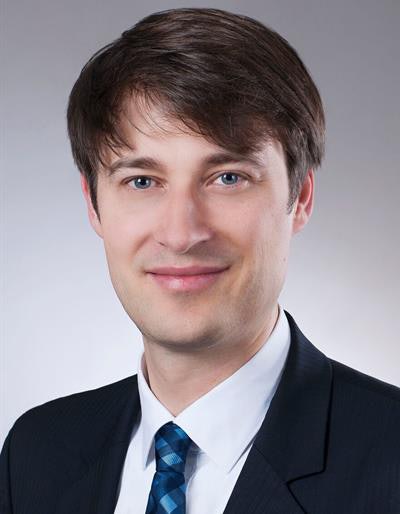 Dr. Alexander Radbruch, JD.