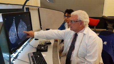Dr. László Tabár in action by his breast imaging PACS workstation. Images courtesy of Dr. László Tabár.