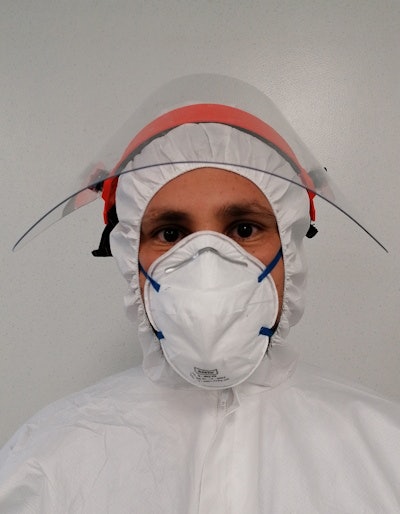 Dr. Umberto Sabatini, PhD, in personal protective equipment.