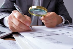 2021 05 07 16 57 0311 Business Magnifying Glass Documents 400