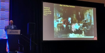 Dr. Abraham Verghese drew from art and history to illustrate the importance of person-to-person care in medicine as medical fields, including radiology, continue to increasingly rely on digital technological resources for patient care. The piece of art he focused on was Luke Fildes' 1891 painting, 'The Doctor' and how it shows the relationship between doctor and patient.