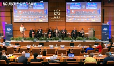 Panelists and attendees at the IAEA's Scientific Forum discuss increasing global radiotherapy capabilities September 27 in Vienna.