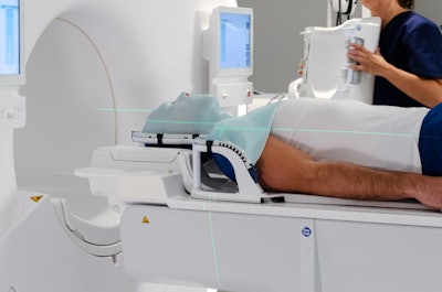 The combination of a Philips’ MR Head and Neck Coil with a mask positioning system from MacroMedics is designed to improve accuracy and patient comfort during MRI for radiotherapy planning. Image courtesy of Philips.