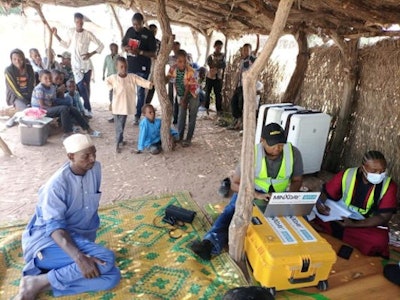 The suitcases used to transport the wireless ultraportable x-ray machines were used as makeshift desks in the communities, the authors noted. Image courtesy of Research Square through CC BY 4.0.