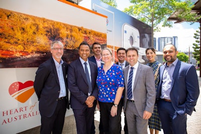 Dr. Catherine Jones (middle), Heart of Australia Founder Dr. Rolf Gomes (left of Dr. Jones), Matt Moran Managing Director Philips Australia and New Zealand (right of Dr. Jones), and the greater Philips Australia team at the launch of the Heart of Australia CT truck in February 2022.
