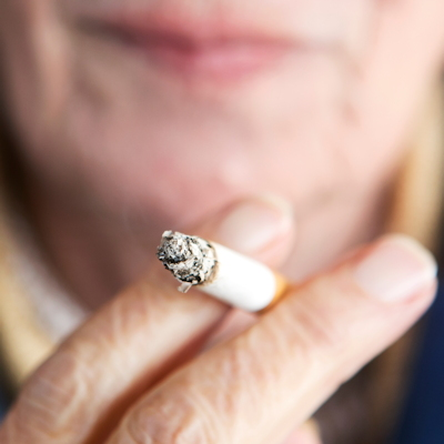 Woman Smoking Older Closeup 400