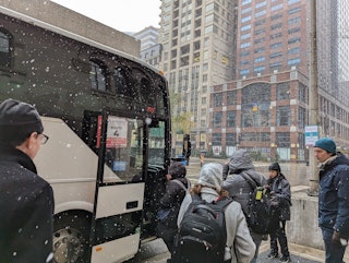 A snowy morning for RSNA attendees boarding the bus to Mccormick Place.