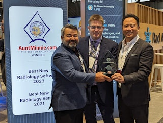 Rad AI CEO Doktor Gurson and Chief Michael Officer William Boonn, MD, receive the 2023 Minnie for Best New Radiology Software from AuntMinnie.com Editor in Chief Erik Ridley. Rad AI won the Minnie for its Omni Reporting software.