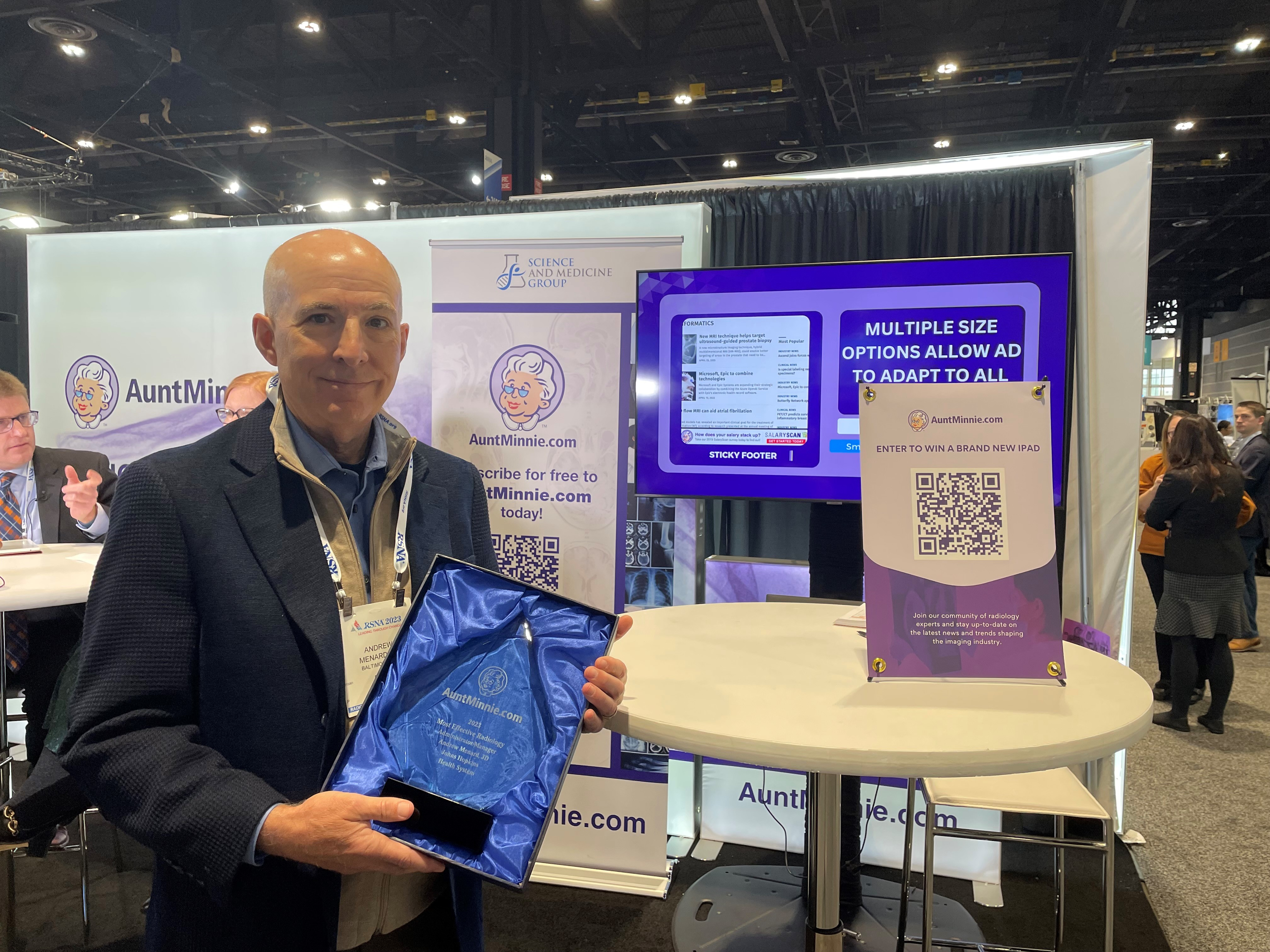 Andrew Menard, JD, of Johns Hopkins Health System accepts his 2023 Minnie for Most Effective Radiology Administrator/Manager.