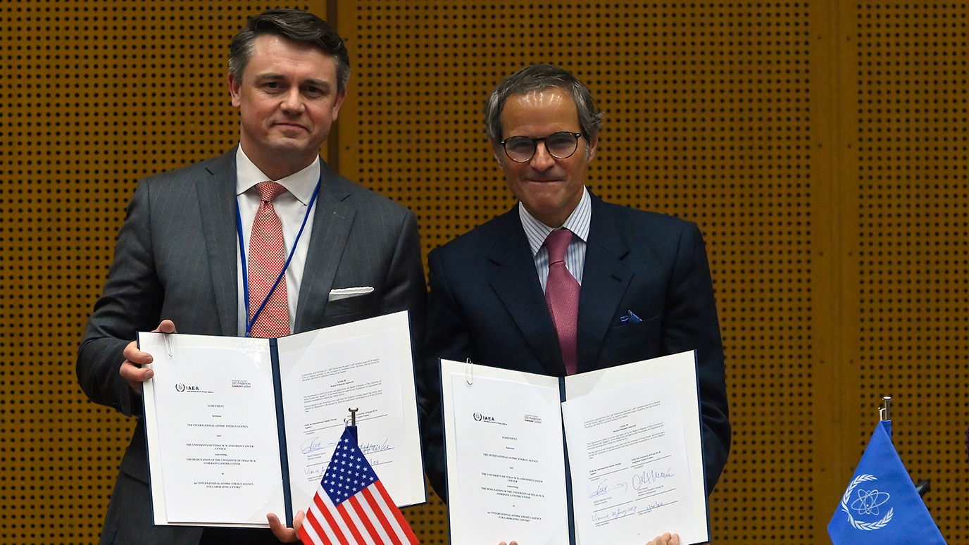 Chris McKee, senior vice president of strategy and business development at MD Anderson Cancer Center (left) and Rafael Mariano Grossi, IAEA Director General (right). The two organizations have signed an agreement that will see the cancer center become an IAEA Collaborating Centre.
