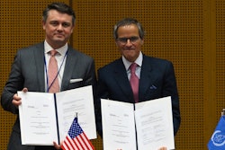 Chris McKee, senior vice president of strategy and business development at MD Anderson Cancer Center (left) and Rafael Mariano Grossi, IAEA Director General (right). The two organizations have signed an agreement that will see the cancer center become an IAEA Collaborating Centre.