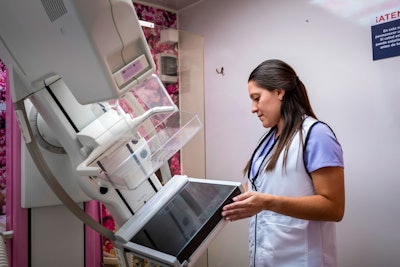 A technician prepares the mammography machine provided by Mamotest, equipped with an AI-based platform, for breast cancer screenings in the mobile unit. PRNewsfoto/Zayed Sustainability Prize