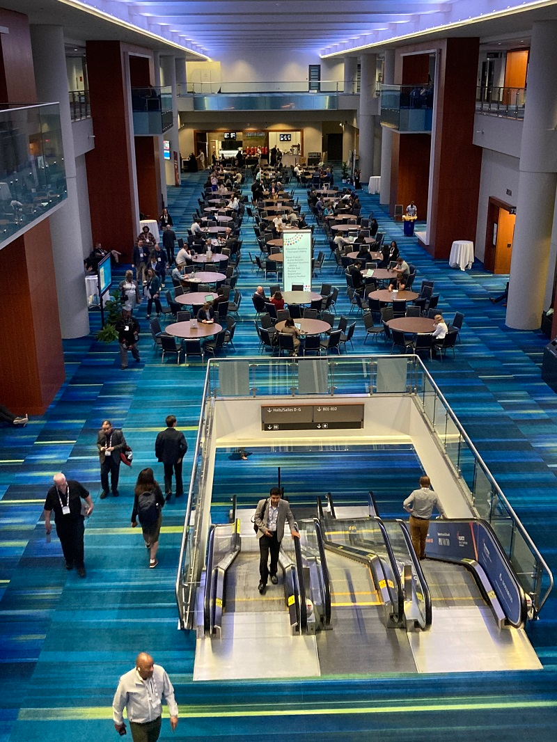 An upper balcony offered views of one of the main floors in the convention center, with meeting rooms to the left and right, and a coffee shop in the background.