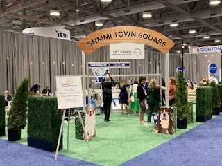 The SNMMI Town Square featured a space that highlighted the benefits of pet therapy.