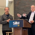 Eliot Siegel, MD, (left) and Charles Kahn Jr., MD, discuss Kahn's presentation at CMIMI 2024.