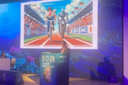 Marc Kohli, MD, discusses current and potential future uses of generative AI in radiology at ECR 2025 in Vienna, Austria. Behind him is an image created by one such generative AI model, which illustrates humans working alongside AI.