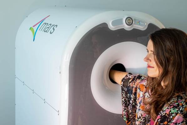 MARS Extremities scanner, a compact spectral CT system for upper extremity imaging.