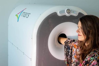 MARS Extremities scanner, a compact spectral CT system for upper extremity imaging.