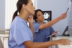 Doctors Working Monitor Consult