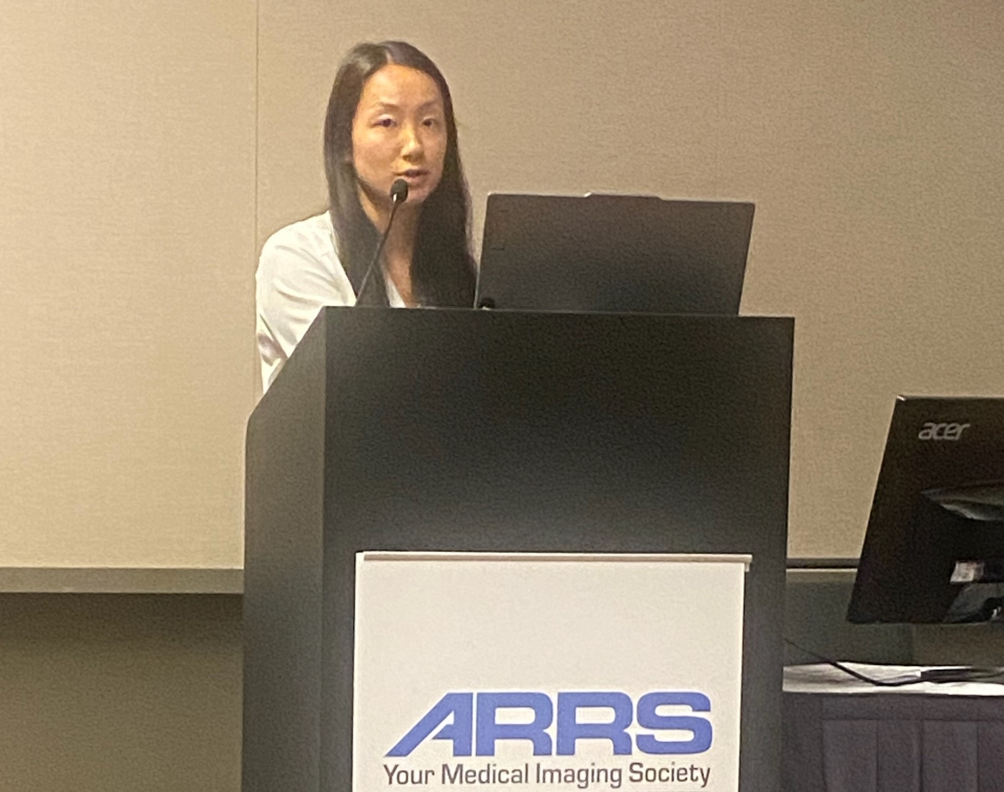 Michelle Li shares results from her team's study on how AI triaging affects report turnaround times and patient outcomes at ARRS 2026.