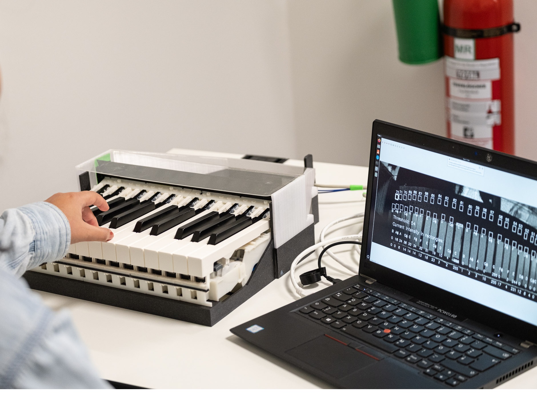 Researchers at ISMRM presented results from a proof-of-concept study showing how a 7T MRI-compatible piano could potentially help take neural measurements.