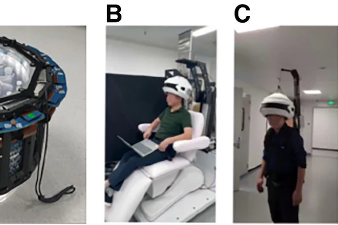 (A) System comprises detectors and silicon photomultipliers with custom Hoffman brain phantom. (B) Seated-position scanning. (C) Backpack system permitting data collection in ambulatory states. (D) Workstation scenario demonstrating natural seated use.