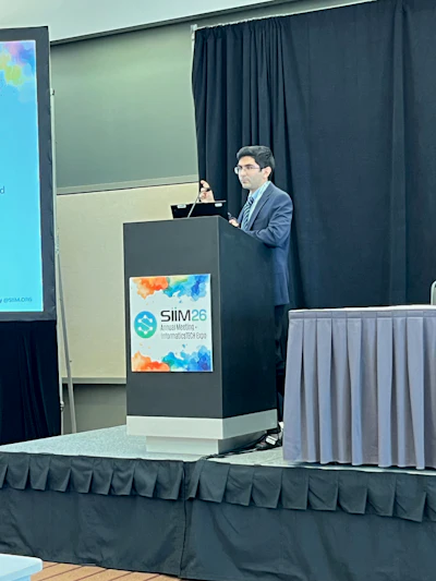 Ali Nowroozi, MD, presents his findings at SIIM 2026 on how LLMs perform in numerical tasks within radiology.