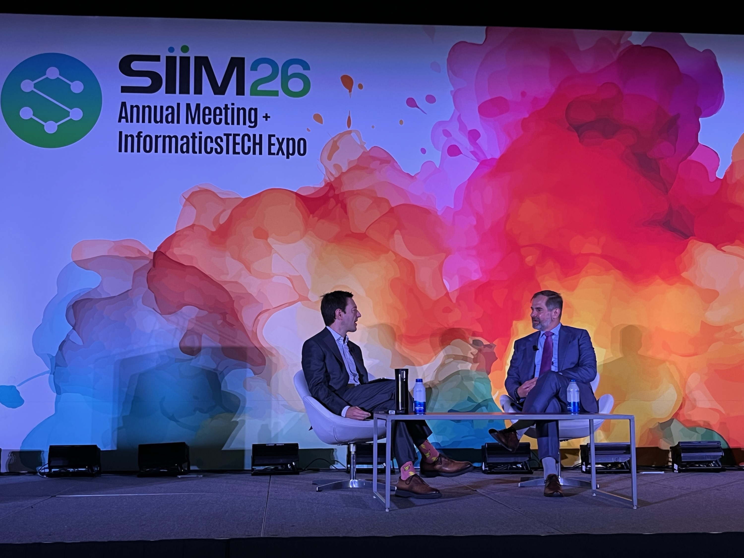 Jason Funderburk, MD (right), shares his thoughts on image sharing, AI, and what emerging technologies will bring in the near future in a fireside chat with incoming SIIM board chair Alex Towbin, MD (left).