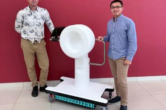 Wellumio co-founders Dr Shieak Tzeng and Dr Sergei Obruchkov with the Axana portable stroke detection device.