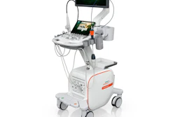Portable ultrasound machine with monitor displaying forest imagery, control panel, and mobile cart base