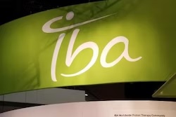 IBA brand logo with white stylized text and circular symbol on green gradient background signage