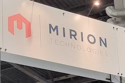 Mirion Technologies corporate logo and text displayed on white trade show booth signage