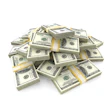 Stack of bundled U.S. $100 bills with gold paper bands arranged in a pile